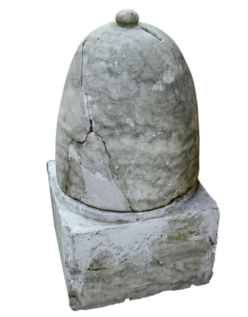 Money jar Marble jar, conical with a knob and a slot on top, all sitting on a heavy, square base.